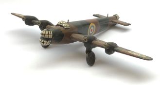 Scratch built wooden model of a WW2 twin-engined bomber, camouflage painted with roundels L46cm