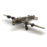 Scratch built wooden model of a WW2 twin-engined bomber, camouflage painted with roundels L46cm