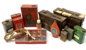 Quantity of empty powder tins; two portable metal ammunition boxes; cartridge wads; oil bottles etc