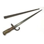 French Model 1874 Epee bayonet the 52cm steel blade inscribed 'Mre. d'Armes de St. Etienne Janvier 1