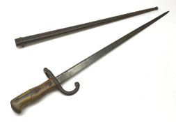 French Model 1874 Epee bayonet the 52cm steel blade inscribed 'Mre. d'Armes de St. Etienne Janvier 1