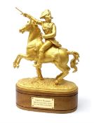 Gilt painted spelter figure of Napoleon Bonaparte on rearing horse, mounted on a later fruitwood bas