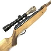 .22 air rifle with under lever action, chequered pistol grip, adjustable butt, camo covered barrel a