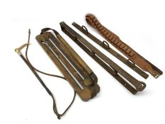 Late 19th/early 20th century gamekeeper's wooden and leather game carrier with two slits, the brass
