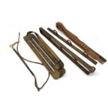 Late 19th/early 20th century gamekeeper's wooden and leather game carrier with two slits, the brass