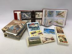 Seven modern albums containing over six hundred postcards and ephemera of aeronautical interest incl