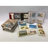 Seven modern albums containing over six hundred postcards and ephemera of aeronautical interest incl