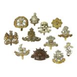 Twelve metal cap badges including South Lancashire Prince of Wales Volunteers, Australian Commonweal