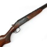 Finnish Valmet 12-bore boxlock over-and-under double barrel shotgun with walnut stock and 65.5cm bar