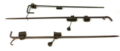 Three vintage cast-iron trip-wire operated blank cartridge firing animal scarers, longest L104cm (3)