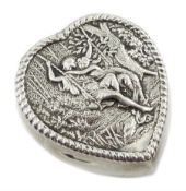 Victorian silver pill box, heart shaped design with embossed hinged lid, depicting figures on a swi