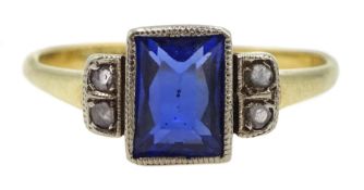 Gold Art Deco synthetic sapphire ring, set with two chip diamonds either side, stamped 18ct & Plat