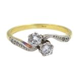 18ct gold two stone diamond cross over ring, with diamond chip shoulders, diamond total weight appro