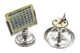 Edwardian silver bridge trumps marker, in the form of a garden sundial with bowl base and ivorine di