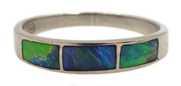 18ct white gold three stone opal ring, rubover set, stamped 750