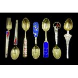 Six silver-gilt and enamel Christmas spoons and a fork by Anton Michelsen, all stamped