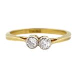 Early 20th century gold two stone milgrain set old cut diamond ring, stamped 18ct