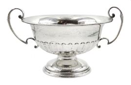 Silver twin handled pedestal bowl, with reeded lower body, by Walker & Hall, Sheffield 1923, approx