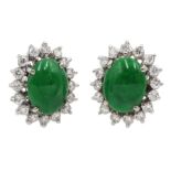 Pair of 14ct white gold cabochon jade and diamond cluster stud earrings, stamped 585