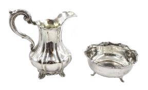 Victorian silver milk jug, scroll handle and on foliate bracket feet by John & Henry Lias, London 1
