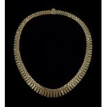 9ct gold fringe necklace, stamped 9 375, approx 66.8gm, retailed by Rusbridge Scarborough boxed