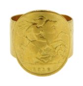 1910 Gold half sovereign on a gold band stamped 22ct