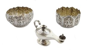 Two Middle Eastern silver bowls with embossed Hindu God decoration, both stamped 85 and an Egyptian