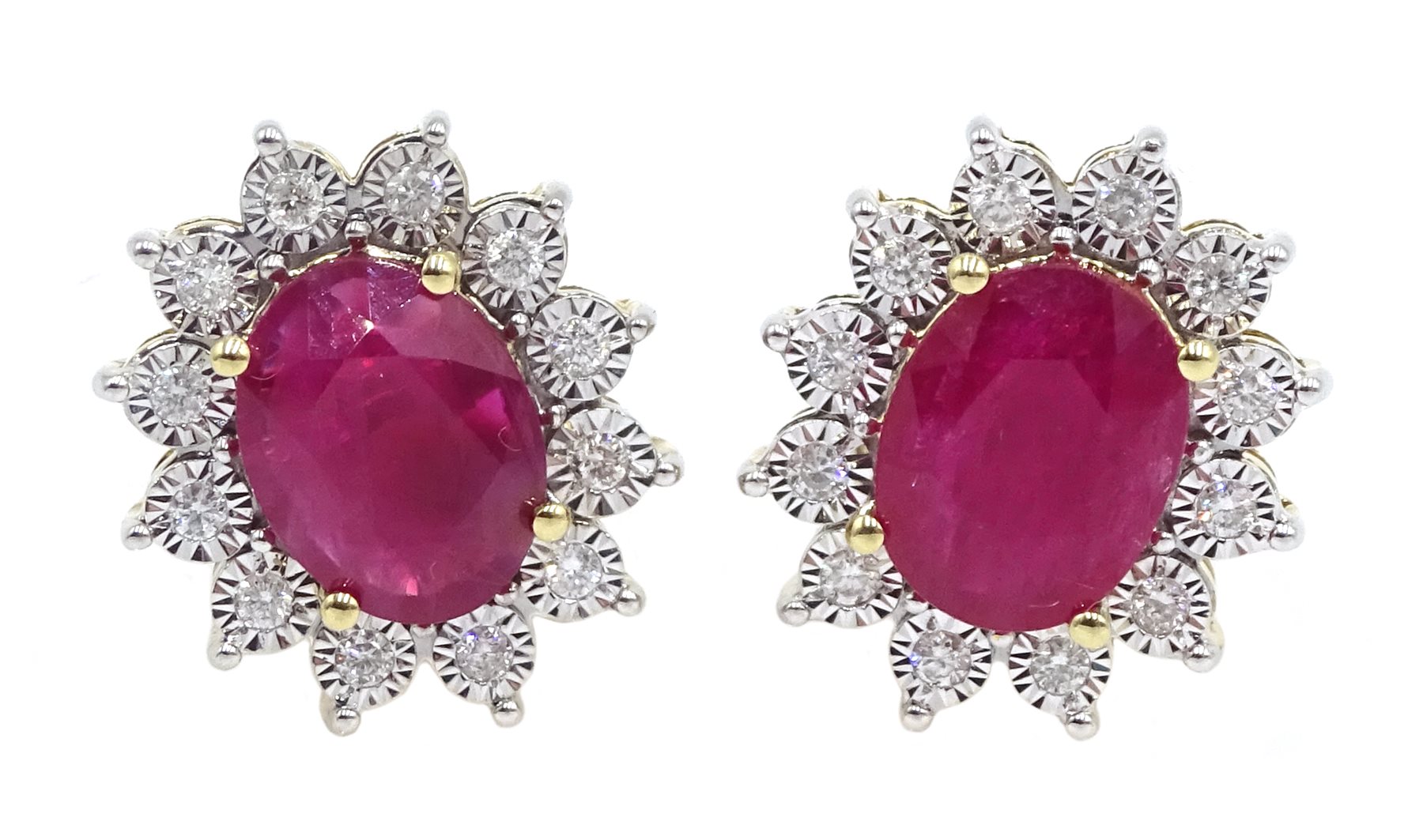 Pair of 9ct gold oval ruby and diamond cluster stud earrings, total ruby weight approx 3.85 carat