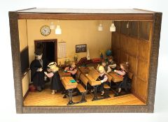 A 1/12th scale diorama of a school room interior, depicting pupils and teacher, the room furnished w