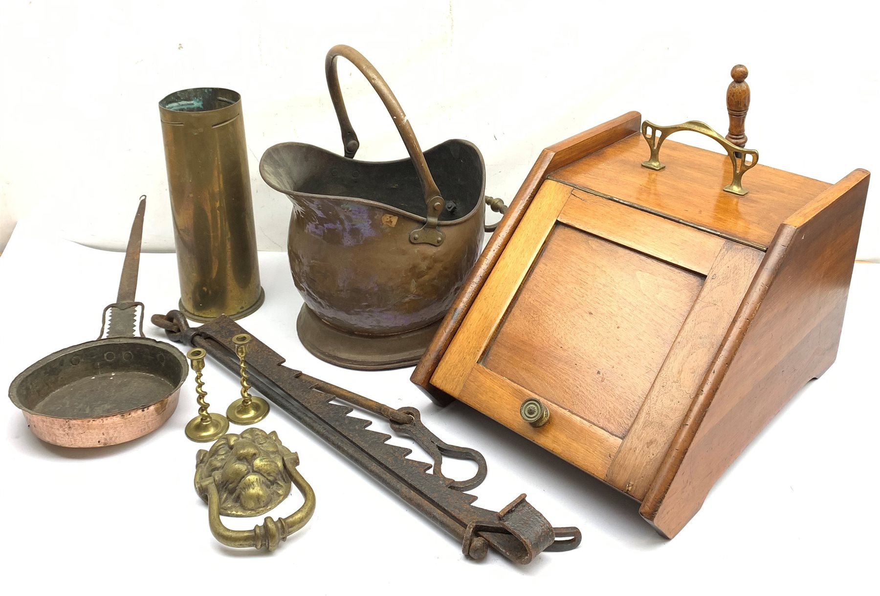 An Edwardian walnut coal scuttle, with shovel, D47cm, together with a copper coal scuttle, a cast br