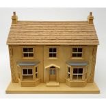 A 24th scale wooden model of a house, or dolls house, with 'tiled' roof, sash windows, and two bay w