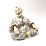 Late 19th century continental porcelain nodding pagoda figure, in the style of Dresden, modelled sea