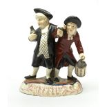 A 19th century Staffordshire figure group, 'Town Crier and Drunk', upon oval scroll detailed base, H