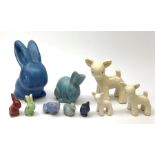 A collection of various Denby models, comprising a blue glazed rabbit, a set of three graduated shee