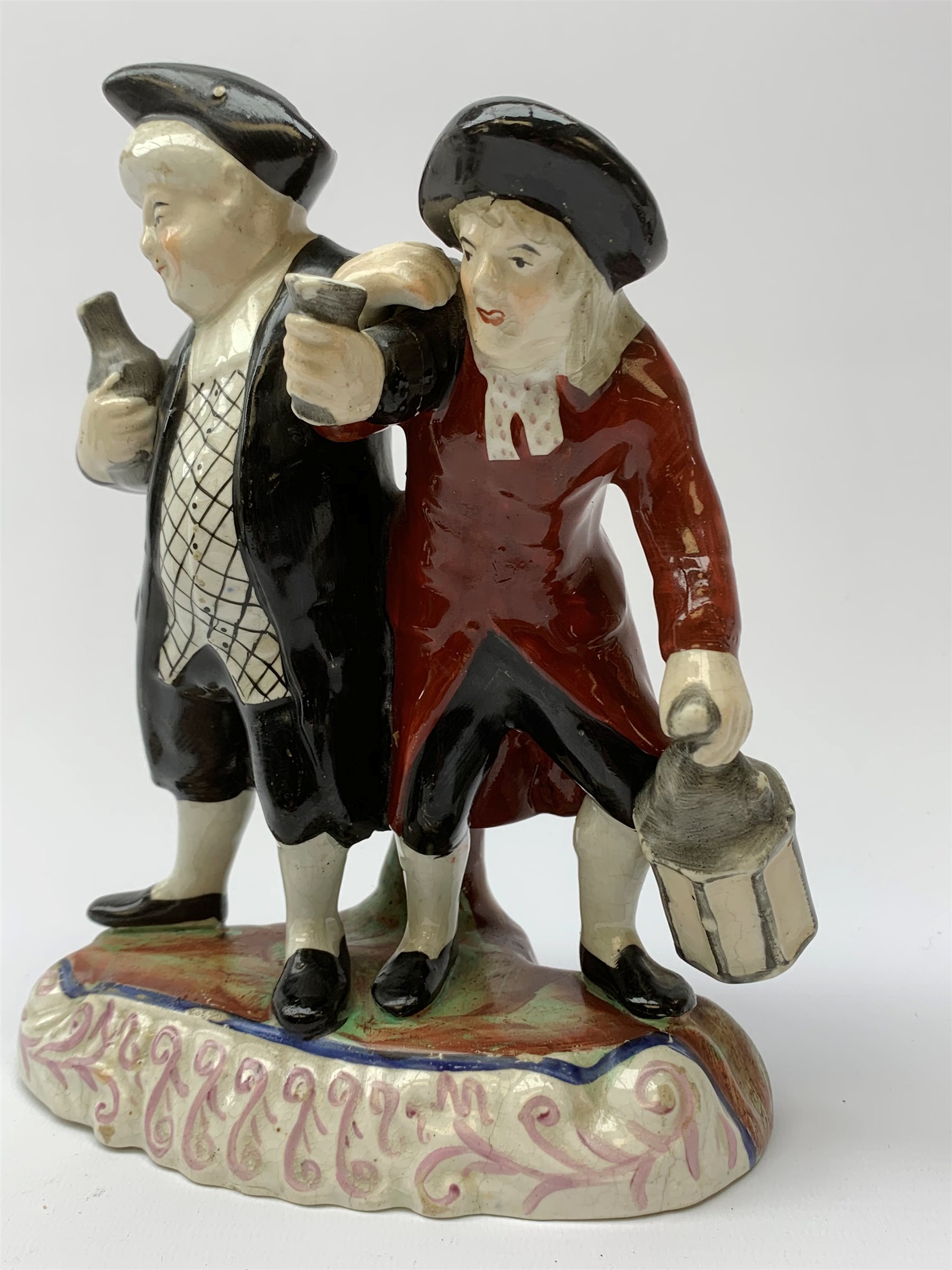 A 19th century Staffordshire figure group, 'Town Crier and Drunk', upon oval scroll detailed base, H - Image 4 of 8