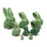 A collection of eight Denby green glazed models of the Rabbits Marmaduke and Cotton tail, various si