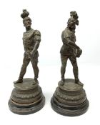 A pair of spelter figures, modelled as warriors, each upon circular stepped base, (a/f), tallest H39