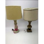 A turned wooden lamp base, with cream shade, overall H53cm, together with another wooden lamp base,