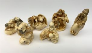 A group of six ivorine netsukes, modelled as various figural, mythological, and zoomorphic subjects,