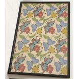 A large framed and glazed crewelwork embroidery, depicting butterflies amidst flowering vines, upon