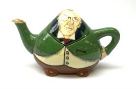 A Foley Intarsio teapot modelled as Joseph Chamberlain, designed by Frederick Rhead, with printed ma