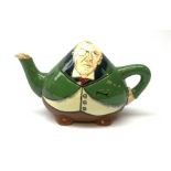 A Foley Intarsio teapot modelled as Joseph Chamberlain, designed by Frederick Rhead, with printed ma