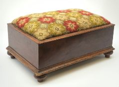 A Victorian mahogany foot stool, of rectangular form with four turned feet and Berlin wool work styl