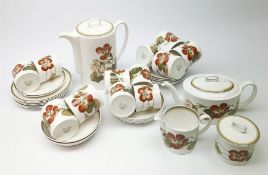 A Susie Cooper Nasturtium pattern tea service, comprising tea pot, coffee pot, six tea cups and six