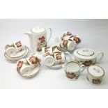 A Susie Cooper Nasturtium pattern tea service, comprising tea pot, coffee pot, six tea cups and six