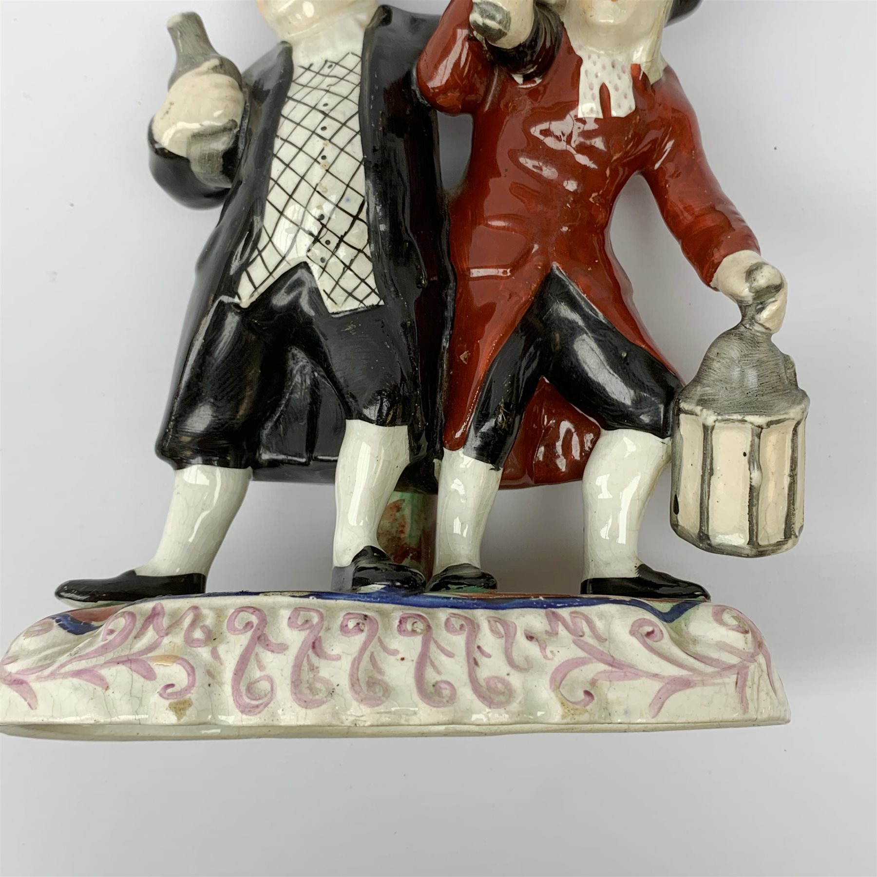 A 19th century Staffordshire figure group, 'Town Crier and Drunk', upon oval scroll detailed base, H - Image 8 of 8