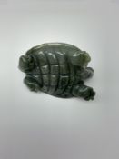 A Chinese carved jade tortoise, L10cm.