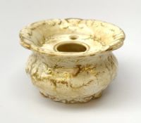 A Rockingham inkwell, with scroll rim, the whole decorated in gilt with a seaweed pattern, with a pr