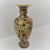 A large 20th century Japanese Satsuma Moriage style floor standing vase, decorated with geishas, H78