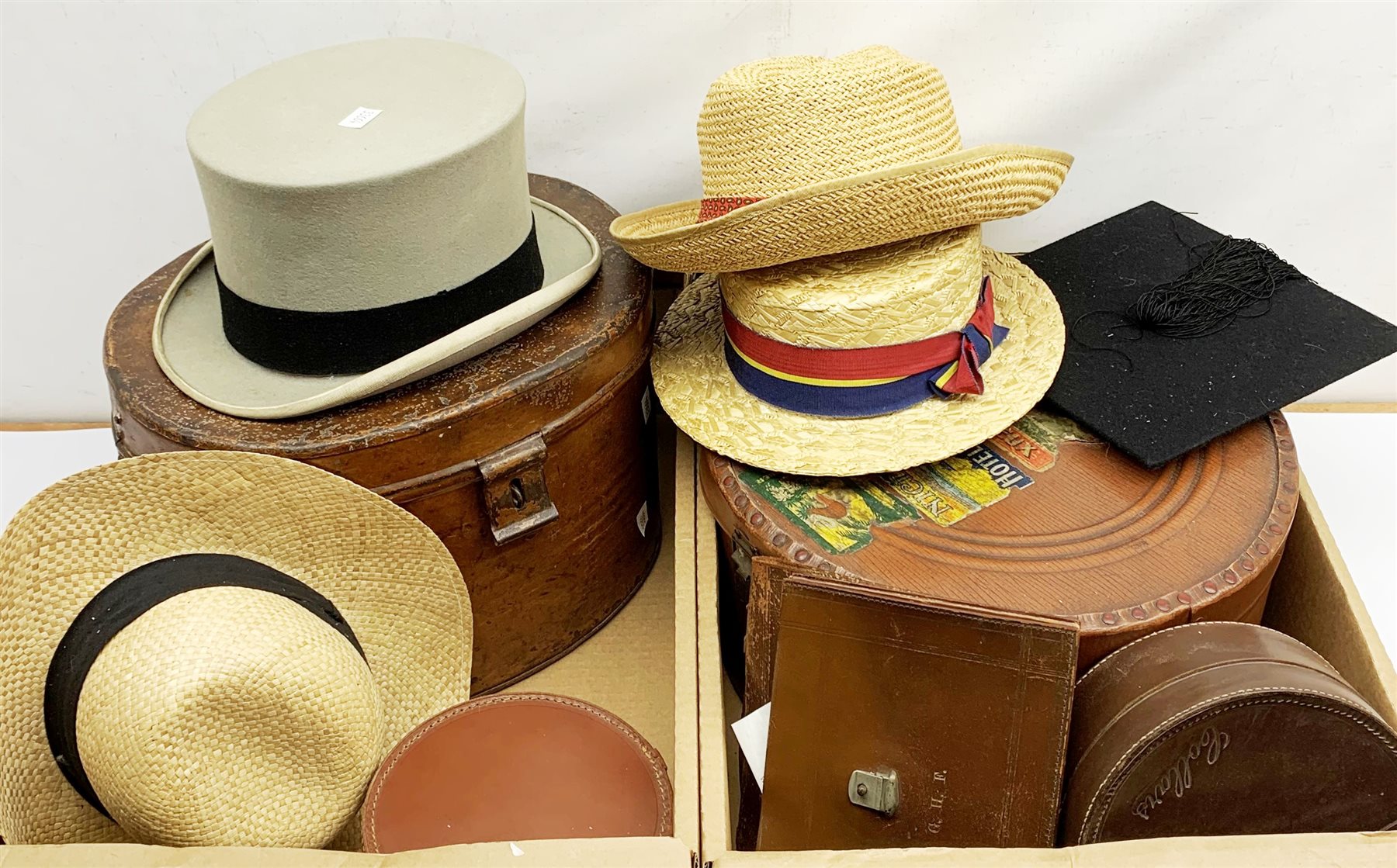 A Victorian tin top hat box, and gentleman's grey top hat by Lock & Co Hatters, Saint James's Street